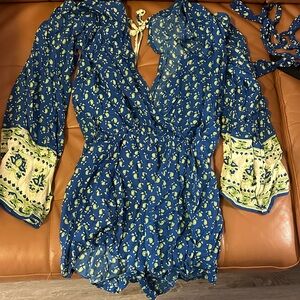 Faithfull the brand Blue Floral Wrap Romper with Contrast Cuffs